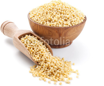 millet_in_a_wooden_bowl_isolated_on_white.jpg